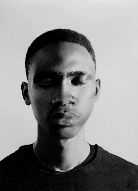 portrait dessin d'un jeune homme d'après photo au Fusain et Graphite